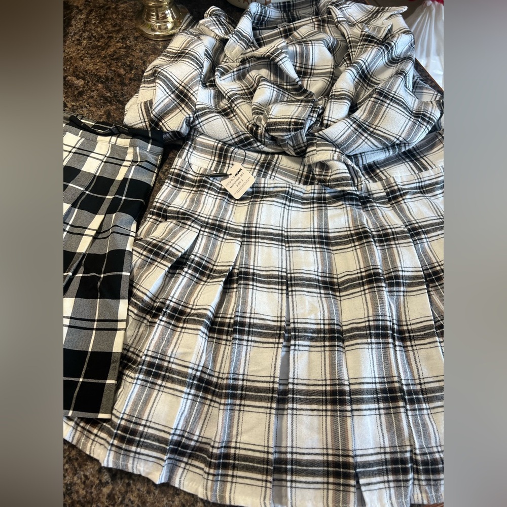 FashionNova black/white skirt set. Bonus skirt included! New with tags.